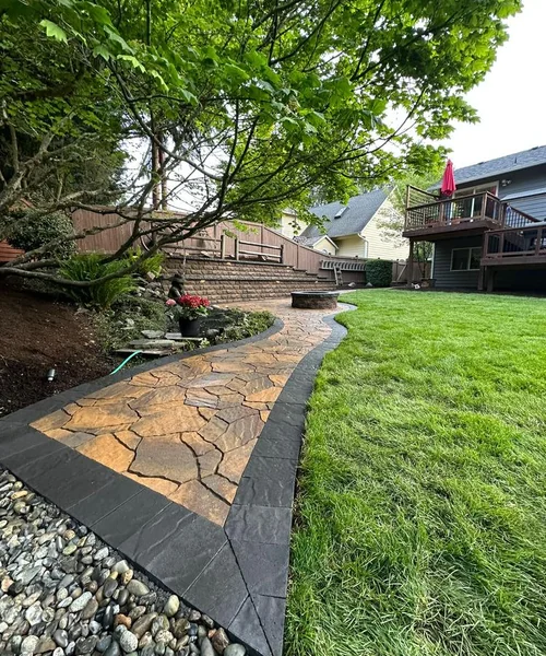 Installation of natural Grass, Retaining wall construction & Fire Pit in Lake Stevens 